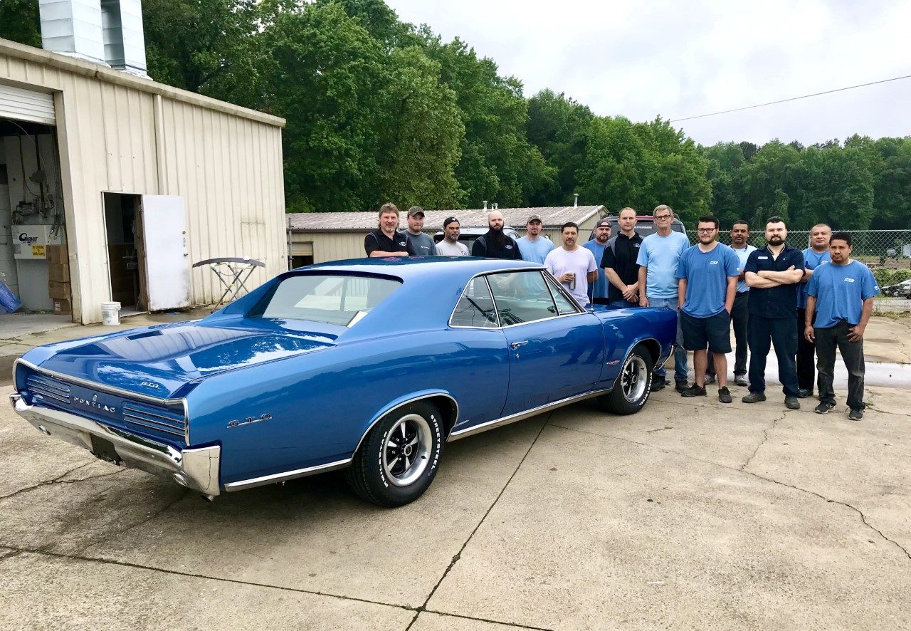 Classic blue Pontiac with the Prime team